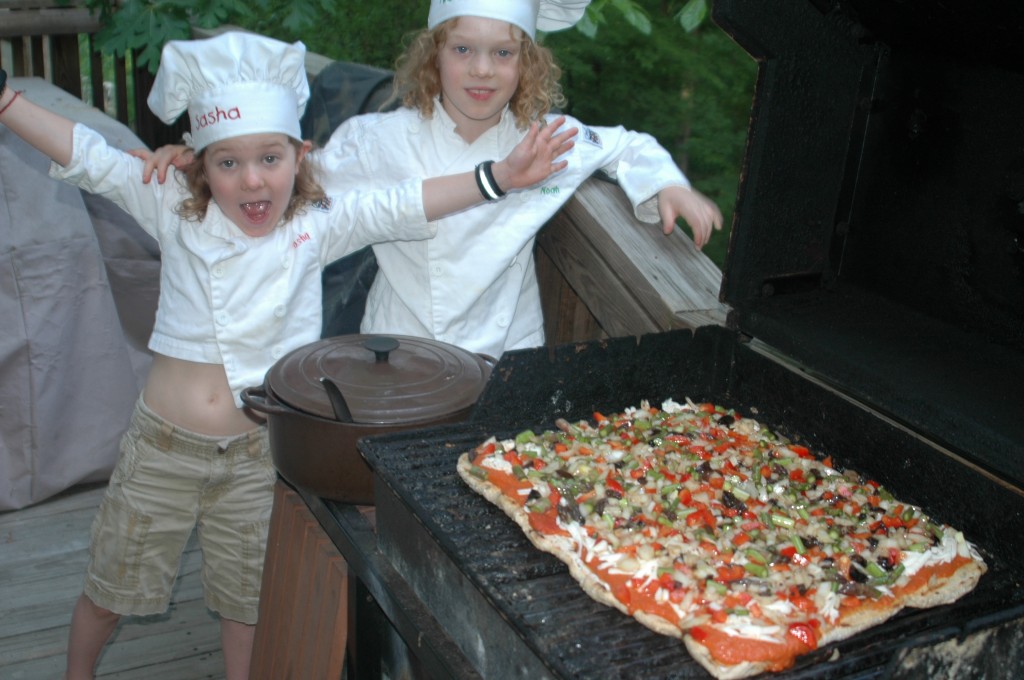 pizza topped with chef Noah and Sasha